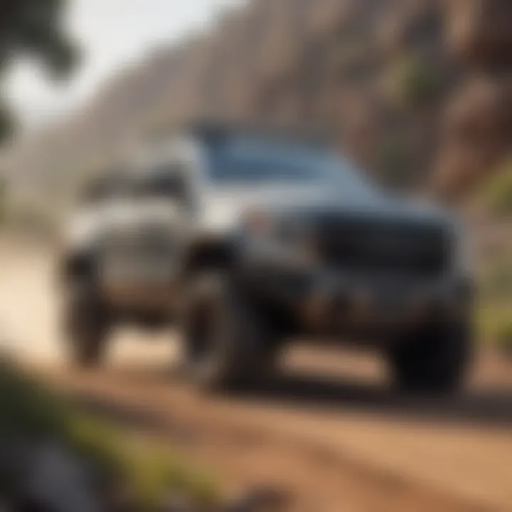 A rugged pickup truck navigating through off-road terrain.