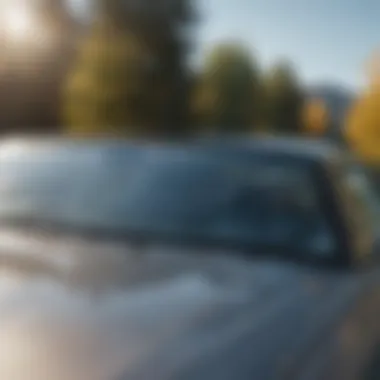 A close-up of a vehicle's clear windshield after using a high-quality cleaner