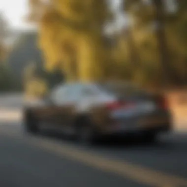 Dynamic driving action shot of the 2021 Acura TLX A-Spec Type S on a winding road.