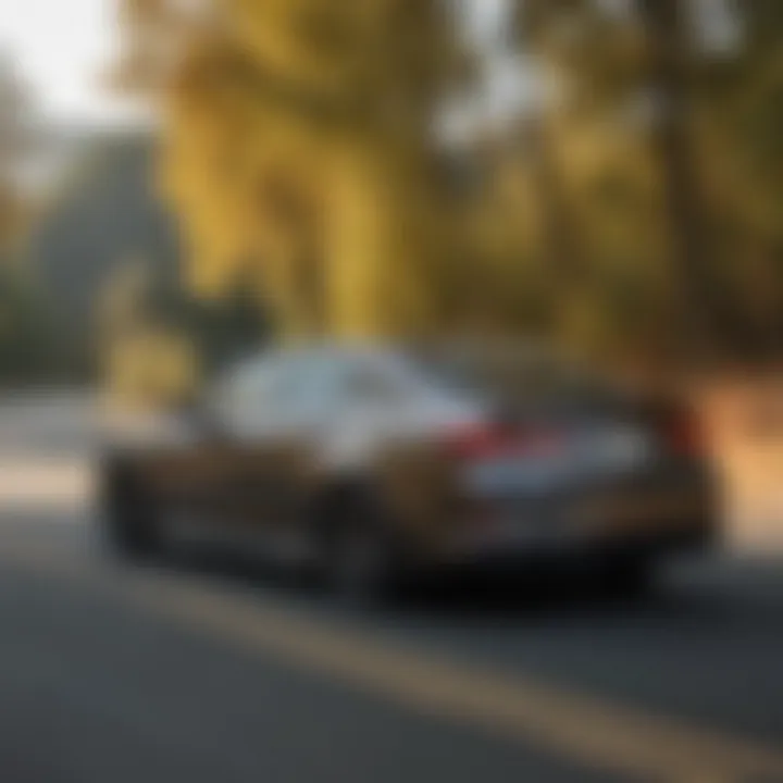 Dynamic driving action shot of the 2021 Acura TLX A-Spec Type S on a winding road.