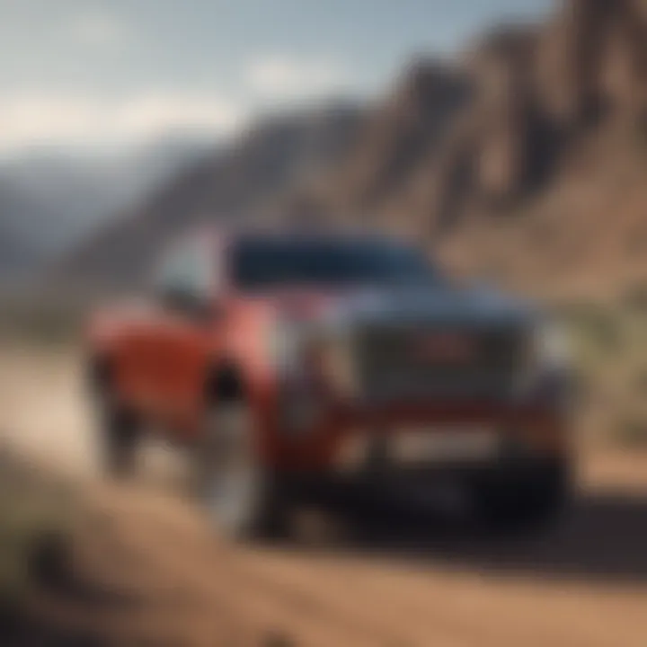 GMC Sierra Denali HD performing off-road with rugged terrain