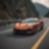 A luxurious grand tourer cruising along a scenic coastal road