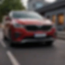 Front view showcasing the sleek grille and modern headlights of the Kia Carnival.