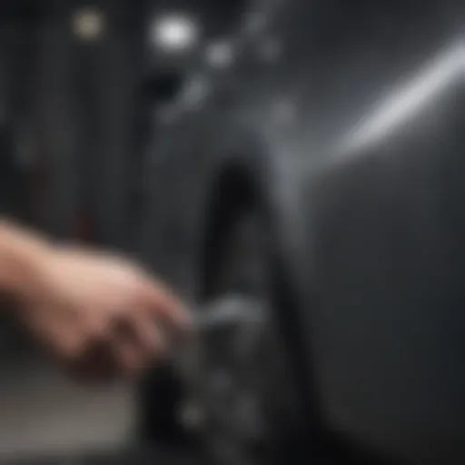 Close-up of a scratch remover being applied to a vehicle surface