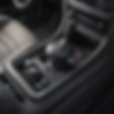 Interior Features of a Manual Small SUV Interior view of a manual small SUV, highlighting the gear stick and dashboard features.