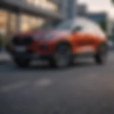 Sleek Manual Small SUV in Urban Landscape A sleek manual small SUV parked in an urban environment, showcasing its compact design.