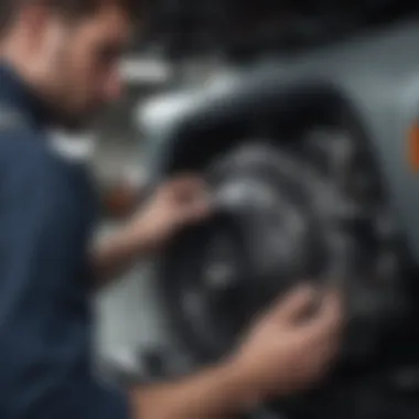 Mechanic examining the transmission system of a vehicle